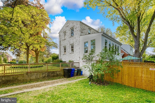 9301 Mintwood St, Silver Spring, MD 20901 - view of home's exterior with a lawn and fence