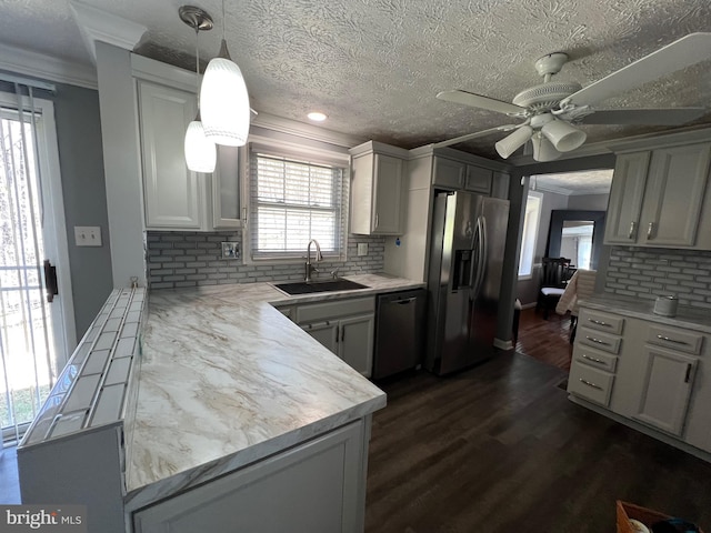 10808 Timberline Dr, Upper Marlboro, MD 20772 - kitchen with a sink, a ceiling fan, stainless steel fridge, dishwasher, and dark wood-style floors