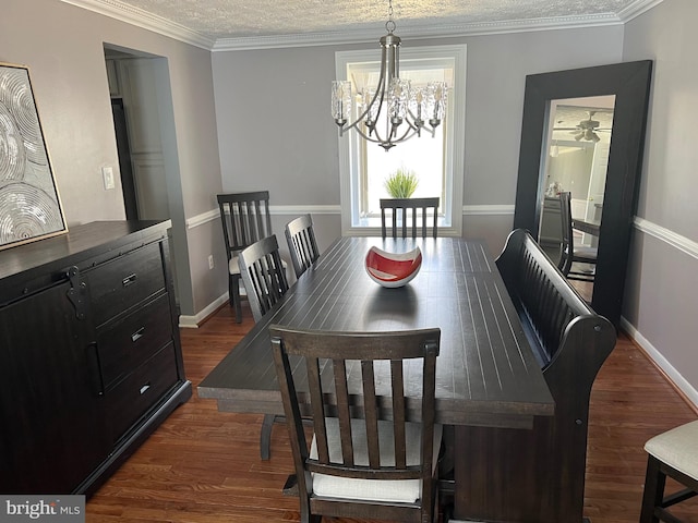 10808 Timberline Dr, Upper Marlboro, MD 20772 - dining space featuring crown molding, dark wood-style flooring, ceiling fan with notable chandelier, baseboards, and a textured ceiling