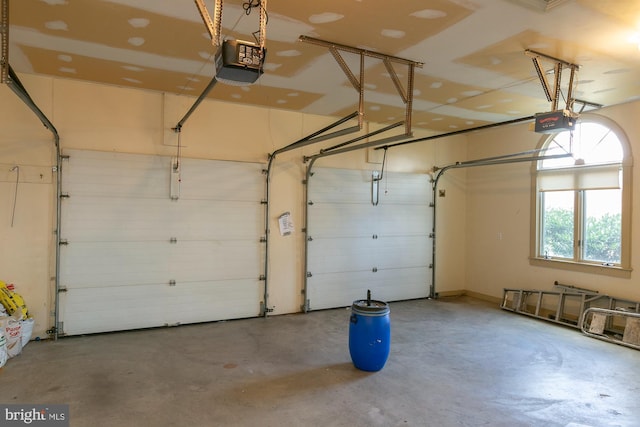garage featuring a garage door opener