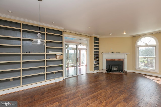 unfurnished living room with wood-type flooring, crown molding, visible vents, baseboards, and recessed lighting
