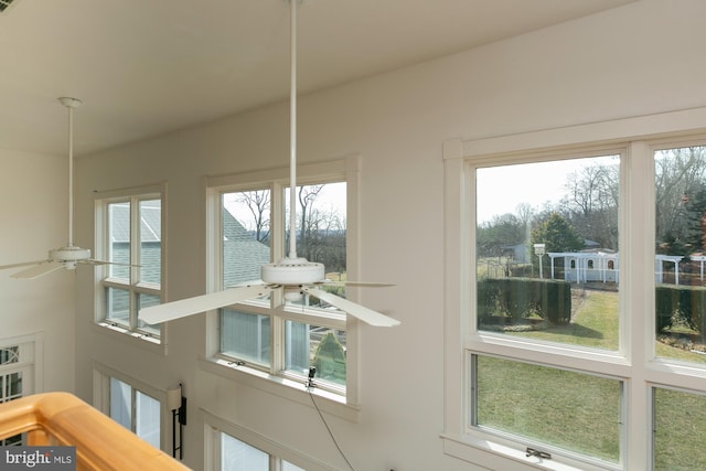 interior details featuring a ceiling fan