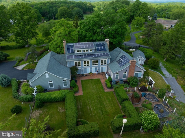 bird's eye view featuring a forest view