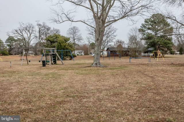 view of yard featuring playground community