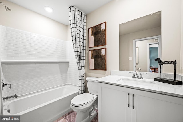 bathroom with toilet, vanity, and shower / bathtub combination with curtain