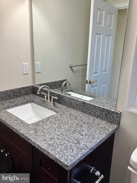 113 Heulings Ave, Riverside, NJ 08075 - half bathroom with vanity and toilet