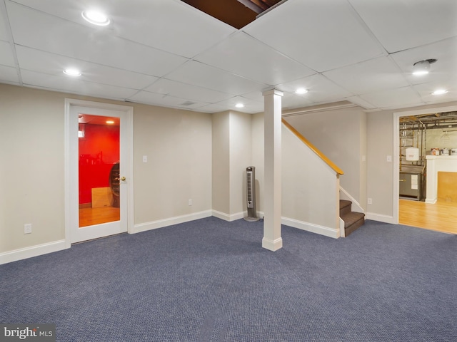 finished basement with recessed lighting, carpet, a drop ceiling, and stairway