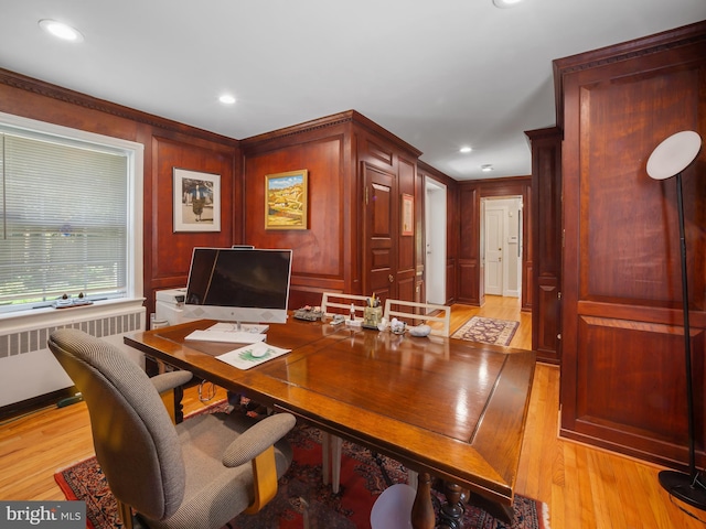 home office featuring light wood-style floors, ornamental molding, radiator heating unit, and recessed lighting