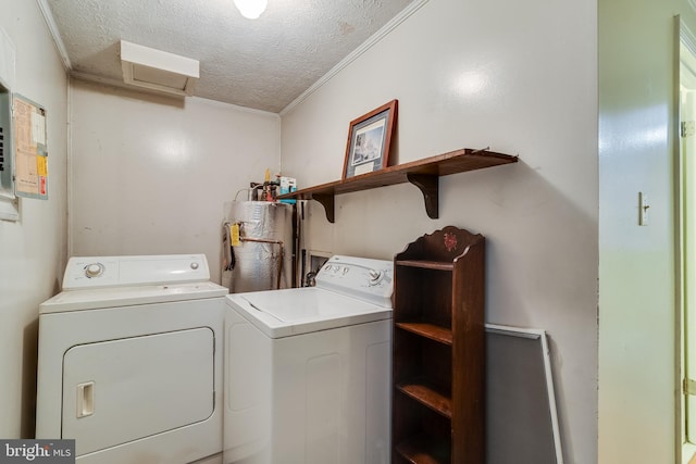 5605 Chapmans Landing Rd, Indian Head, MD 20640 - laundry area with washing machine and clothes dryer, a textured ceiling, crown molding, and gas water heater