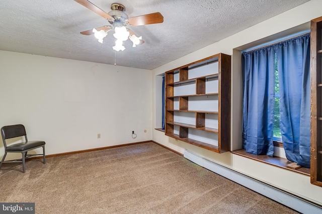 5605 Chapmans Landing Rd, Indian Head, MD 20640 - unfurnished room with a baseboard radiator, a textured ceiling, carpet floors, and ceiling fan