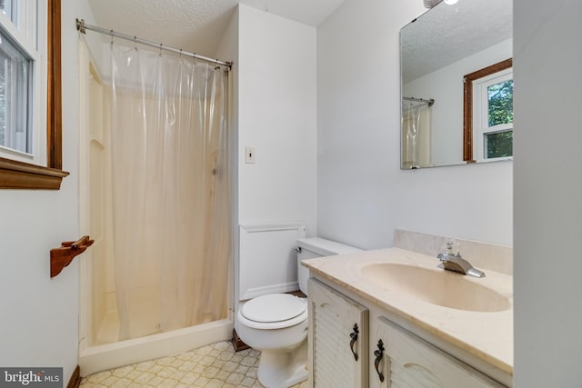 5605 Chapmans Landing Rd, Indian Head, MD 20640 - full bath featuring vanity, a textured ceiling, and a shower with curtain