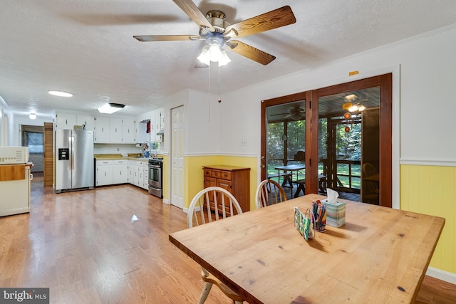 5605 Chapmans Landing Rd, Indian Head, MD 20640 - dining area featuring light wood-type flooring, a textured ceiling, ceiling fan, and french doors