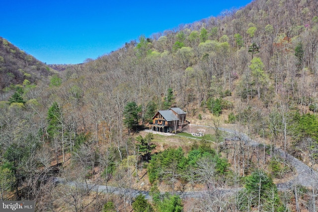 property view of mountains with a forest view