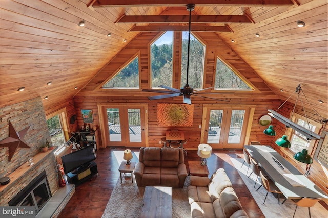 living room with french doors, high vaulted ceiling, and wooden ceiling
