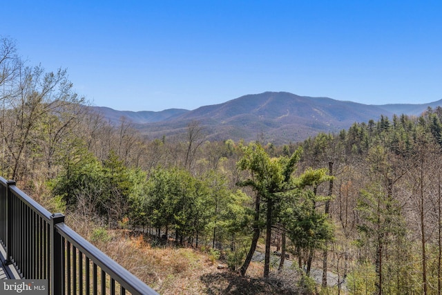 mountain view featuring a view of trees