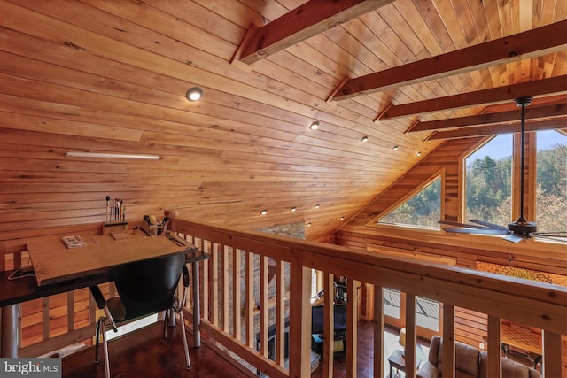 hallway with vaulted ceiling with beams, wooden walls, wooden ceiling, and wood finished floors