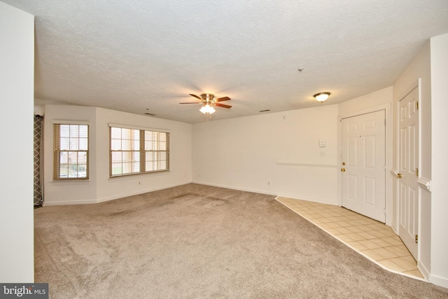 106 Gwen Dr Unit 106-2H, Forest Hill, MD 21050 - unfurnished room featuring carpet floors, a ceiling fan, baseboards, and a textured ceiling