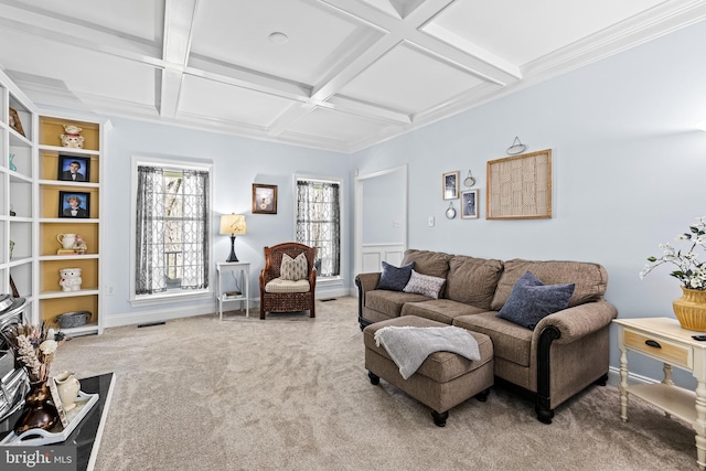 living area with wainscoting, visible vents, beam ceiling, coffered ceiling, and carpet
