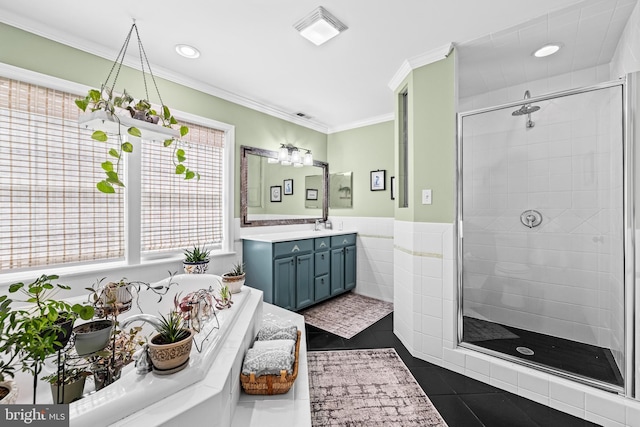 full bathroom featuring crown molding, a shower stall, recessed lighting, vanity, and tile patterned floors