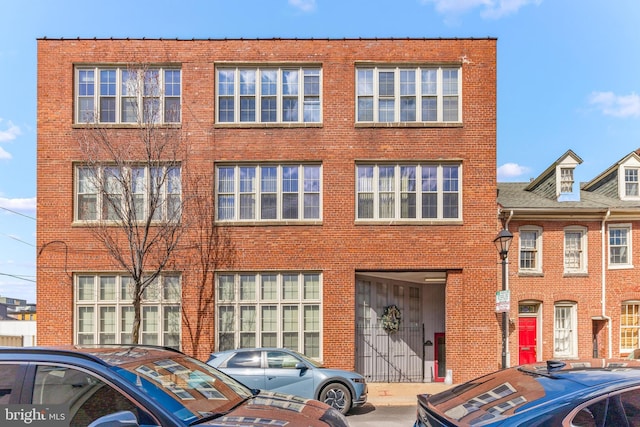 1516 Lancaster St, Baltimore, MD 21231 - townhome / multi-family property with brick siding