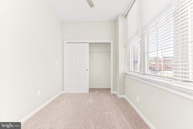 1516 Lancaster St, Baltimore, MD 21231 - unfurnished bedroom with carpet floors, a closet, and a ceiling fan