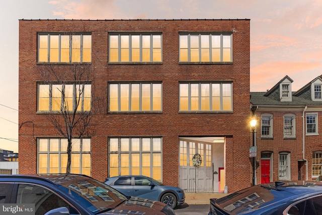 1516 Lancaster St, Baltimore, MD 21231 - view of front facade featuring brick siding