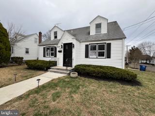 51 S Pine Ave, Maple Shade, NJ 08052 - cape cod home featuring a front lawn