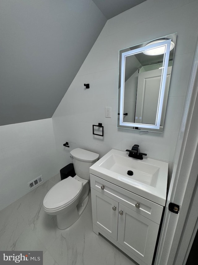 51 S Pine Ave, Maple Shade, NJ 08052 - half bath featuring visible vents, marble finish floor, toilet, vanity, and vaulted ceiling
