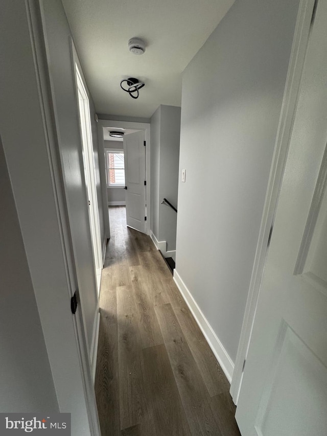 51 S Pine Ave, Maple Shade, NJ 08052 - corridor with baseboards, an upstairs landing, and wood finished floors