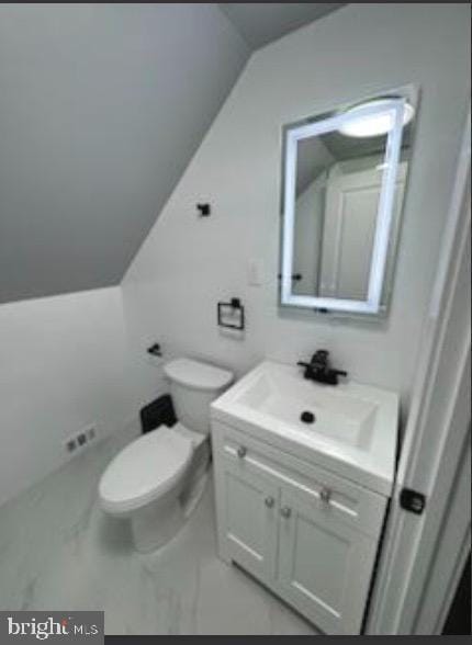51 S Pine Ave, Maple Shade, NJ 08052 - bathroom featuring lofted ceiling, toilet, marble finish floor, and vanity
