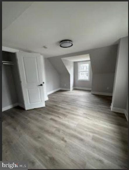 51 S Pine Ave, Maple Shade, NJ 08052 - bonus room featuring baseboards, vaulted ceiling, and wood finished floors