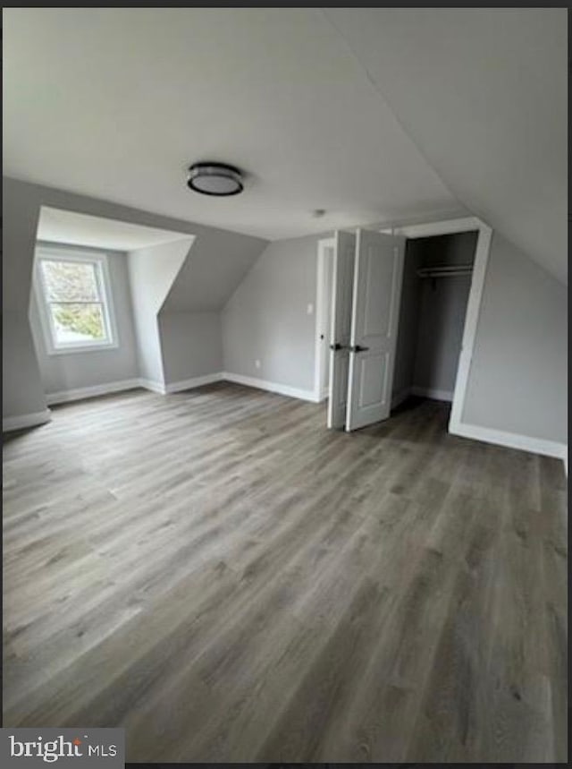 51 S Pine Ave, Maple Shade, NJ 08052 - additional living space with baseboards, lofted ceiling, and wood finished floors