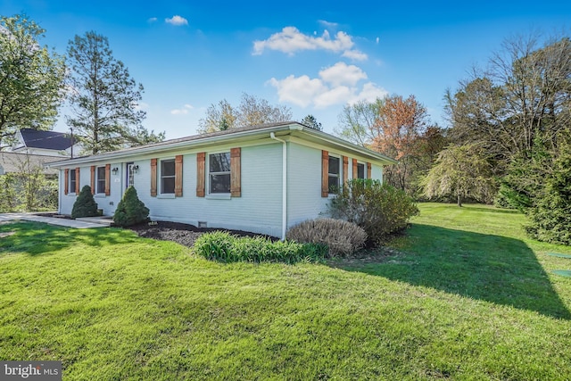 123 Somerset Rd, Stevensville, MD 21666 - ranch-style house with a front lawn