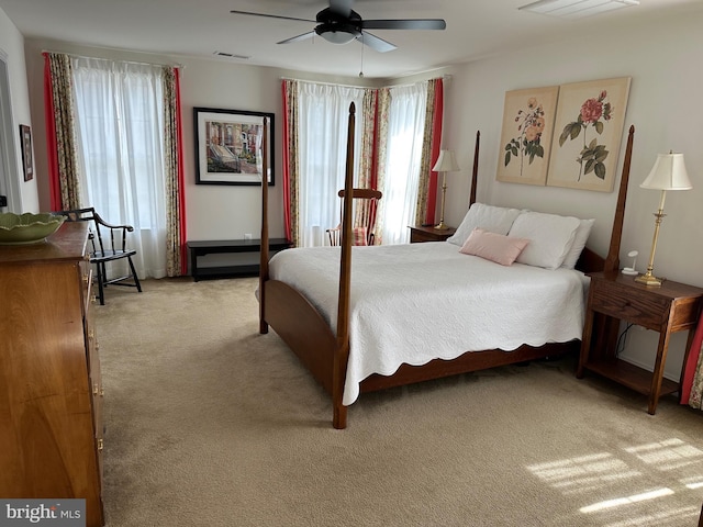 8537 Pine Springs Dr, Severn, MD 21144 - bedroom featuring light colored carpet, visible vents, and ceiling fan