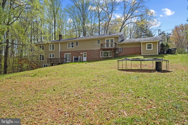 7058 Crespo Ln, Manassas, VA 20112 - rear view of house featuring a wooden deck, brick siding, french doors, a yard, and a chimney