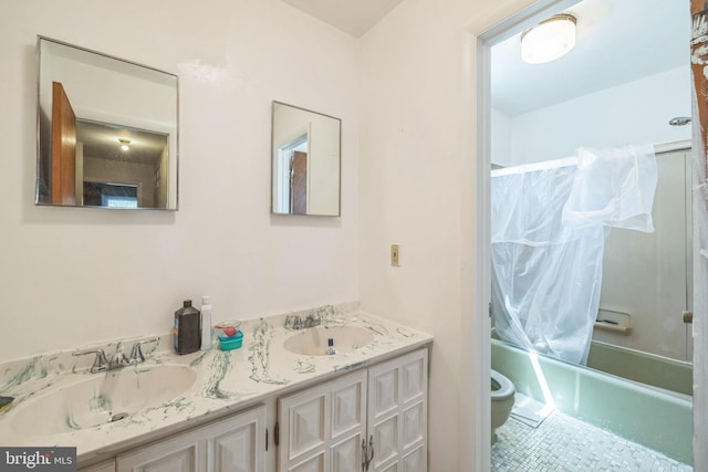 bathroom featuring toilet, a sink, shower / bath combo with shower curtain, and double vanity