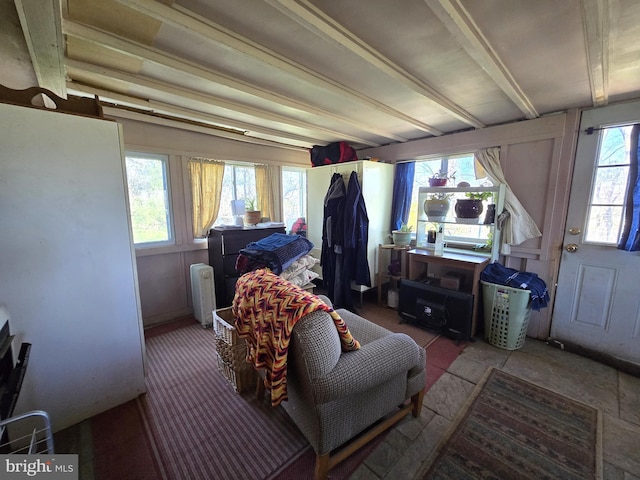 bedroom featuring beamed ceiling