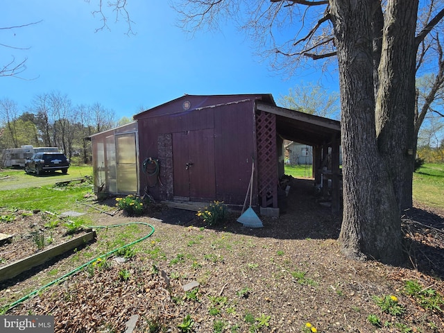 view of outbuilding with an outbuilding