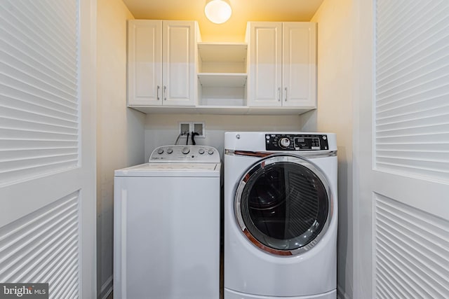 19062 Timbercreek Dr Unit 46, Milton, DE 19968 - clothes washing area with cabinet space and washer and clothes dryer