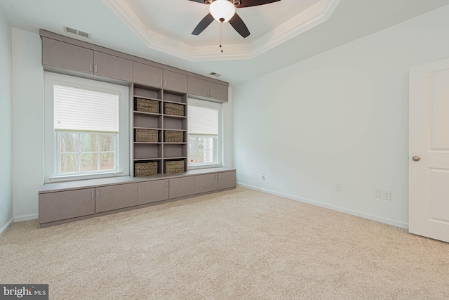 19062 Timbercreek Dr Unit 46, Milton, DE 19968 - carpeted empty room with a ceiling fan, a raised ceiling, baseboards, visible vents, and ornamental molding