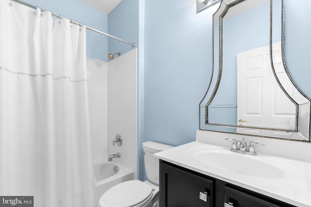 bathroom featuring shower / bathtub combination with curtain, vanity, and toilet