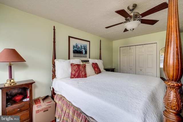 bedroom featuring a closet, ceiling fan, and a textured ceiling