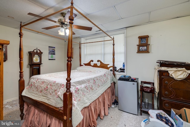 bedroom featuring a ceiling fan and refrigerator
