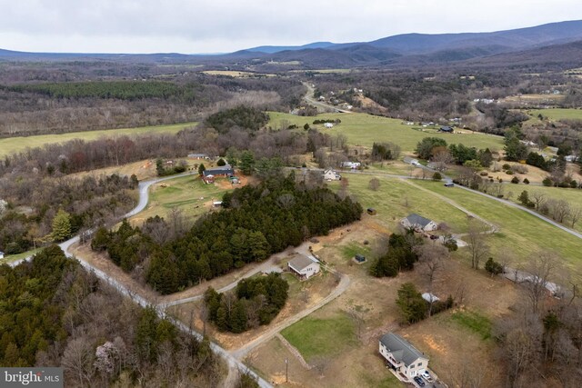aerial view with a mountain view and a rural view