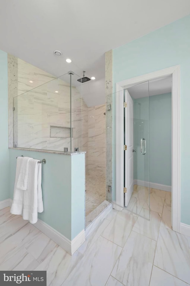 full bath featuring a shower stall, marble finish floor, baseboards, and recessed lighting