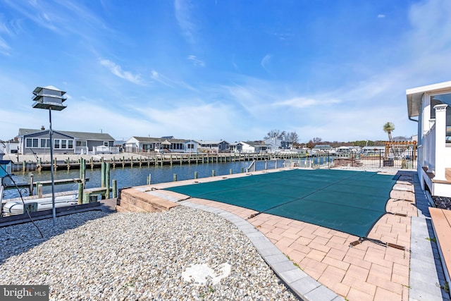 402 Atlantic City Ct, Lanoka Harbor, NJ 08734 - view of pool with a residential view, a water view, a boat dock, and a patio