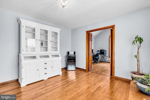 402 Atlantic City Ct, Lanoka Harbor, NJ 08734 - interior space with light wood finished floors, baseboards, and a textured ceiling