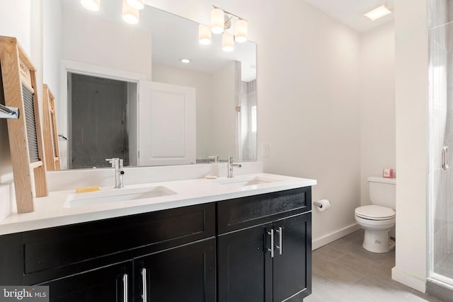1649 N Randolph St, Philadelphia, PA 19122 - full bath with toilet, double vanity, and baseboards