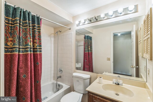 full bath with vanity, toilet, and shower / tub combo