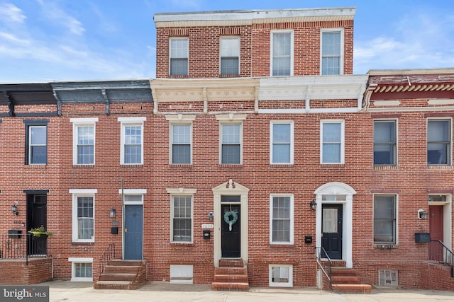 1614 Patapsco St, Baltimore, MD 21230 - townhome / multi-family property with entry steps and brick siding
